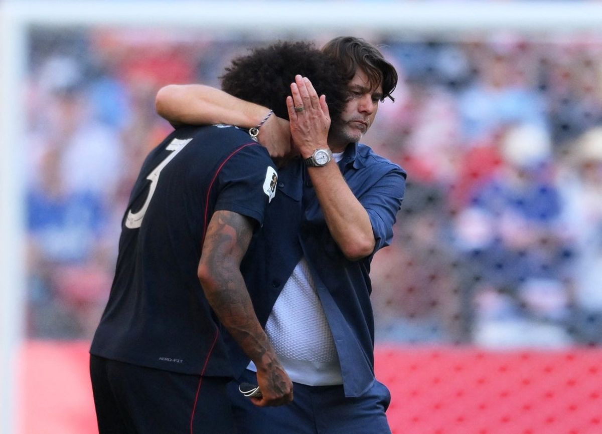 July 6, 2026; Seattle, Washington, U.S.; Chris Richards of the U.S. looks dejected as he is consoled by coach Mauricio Pochettino after the match following their elimination from the World Cup.  Mandatory Credit: Steven Bisig-Imagn Images