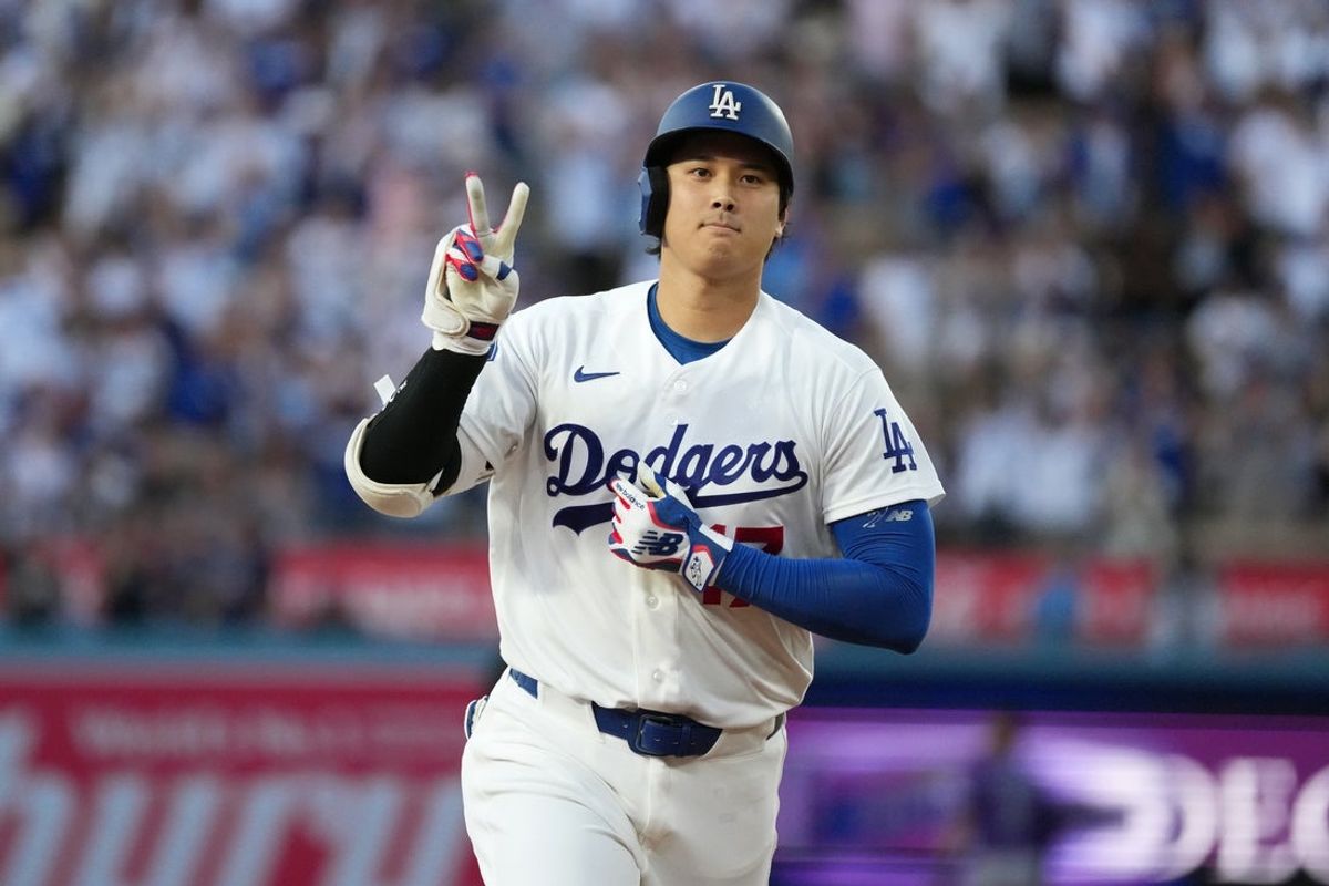 Jul 6, 2026; Los Angeles, California, USA; Los Angeles Dodgers designated hitter Shohei Ohtani (17) runs after hitting a two run home run against the Colorado Rockies in the third inning at Dodger Stadium. Mandatory Credit: Kirby Lee-Imagn Images