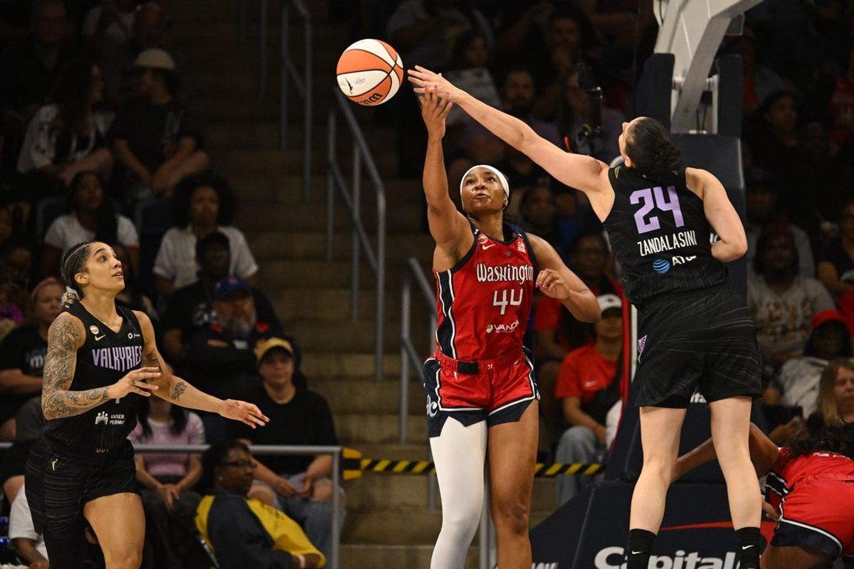 Jul 6, 2026; Washington, District of Columbia, USA; Washington Mystics forward Kiki Iriafen (44) and Golden State Valkyries forward Cecilia Zandalasini (24) battle for a rebound during the third quarter at CareFirst Arena. Mandatory Credit: Rafael Suanes-Imagn Images