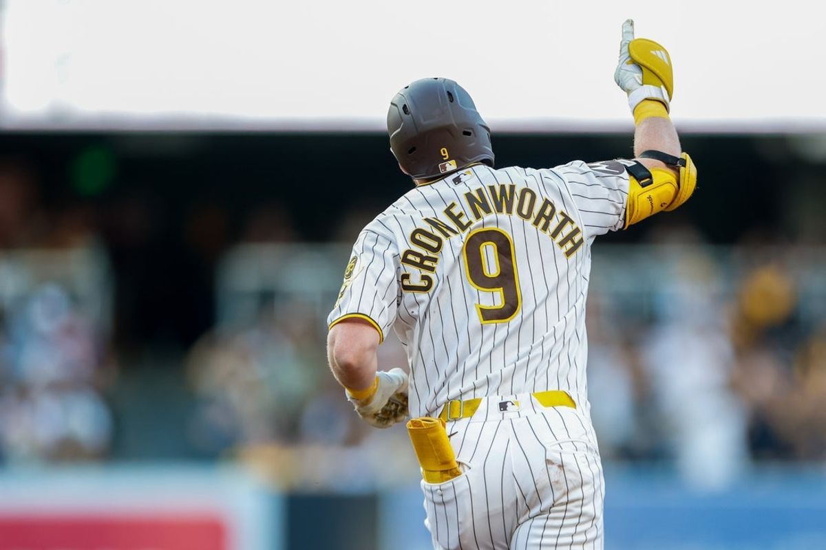Jul 7, 2026; San Diego, California, USA; San Diego Padres first baseman Jake Cronenworth (9) celebrates after hitting a three-run home run during the first inning against the Arizona Diamondbacks at Petco Park. Mandatory Credit: David Frerker-Imagn Images