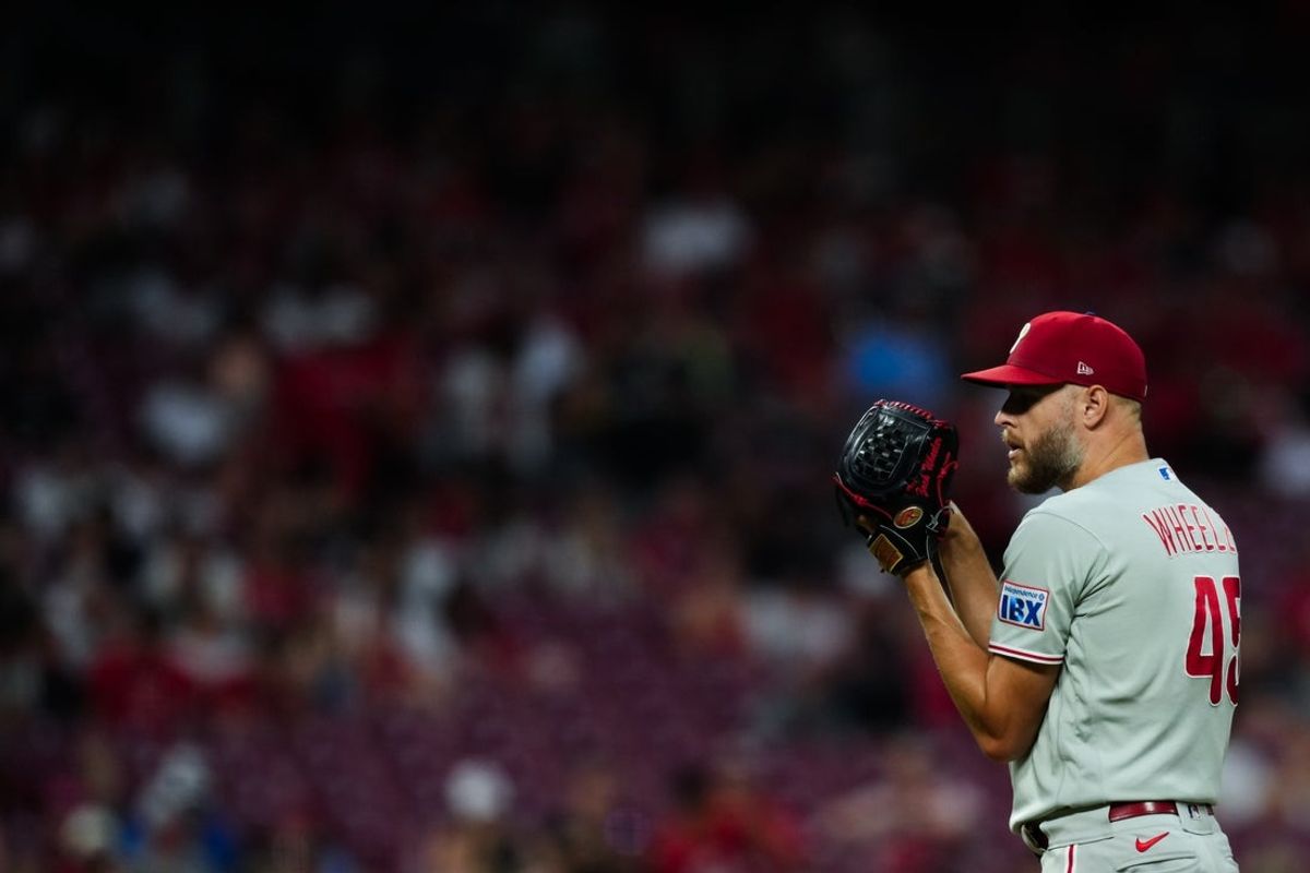 Jul 7, 2026; Cincinnati, Ohio, USA; Philadelphia Phillies pitcher Zack Wheeler (45) prepares to throw against the Cincinnati Reds in the seventh inning at Great American Ball Park. Mandatory Credit: Aaron Doster-Imagn Images