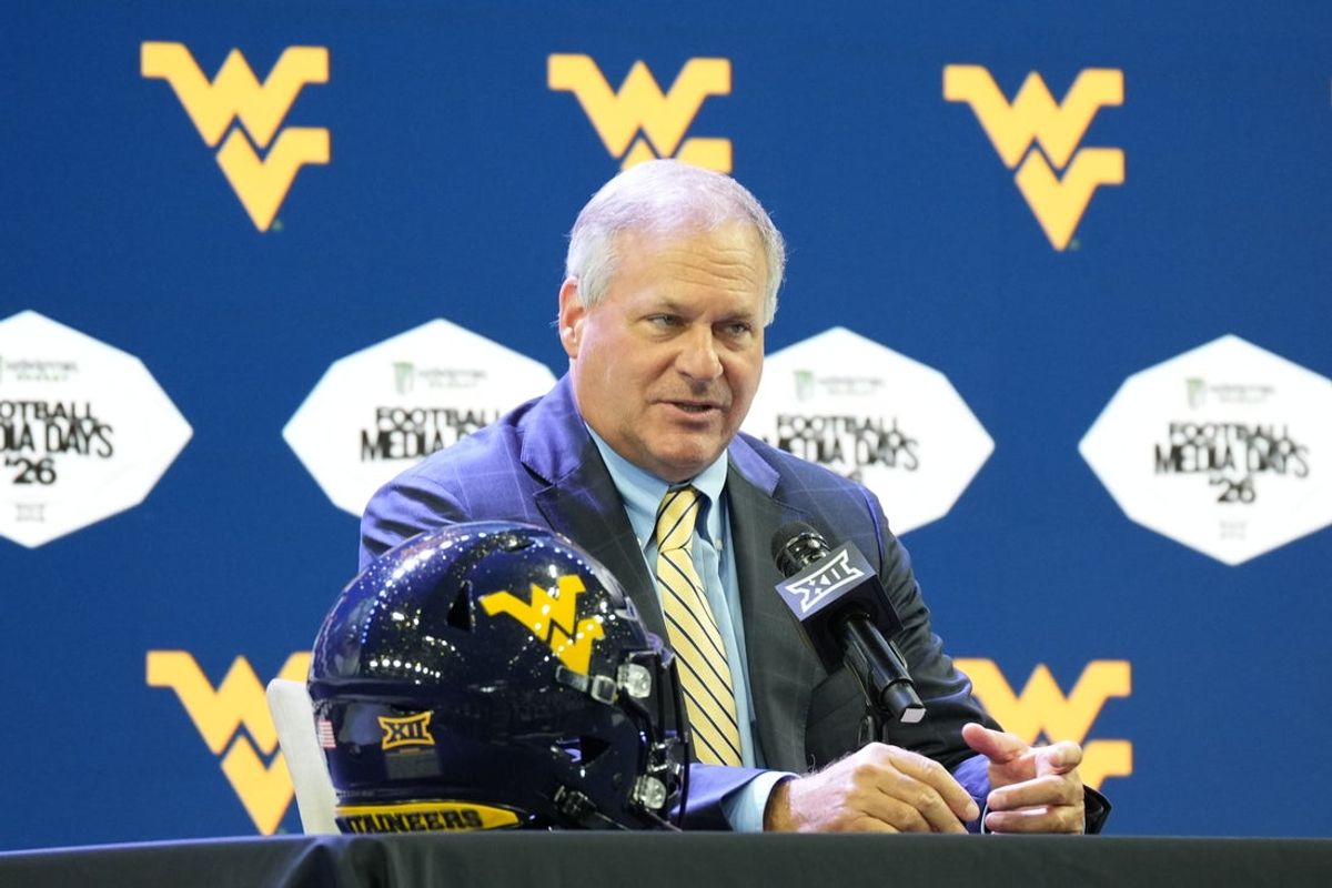 Jul 8, 2026; Frisco, TX, USA;  West Virginia head coach Rich Rodriguez speaks to reporters during Big 12 Conference Football Media Days at The Star. Mandatory Credit: Raymond Carlin III-Imagn Images