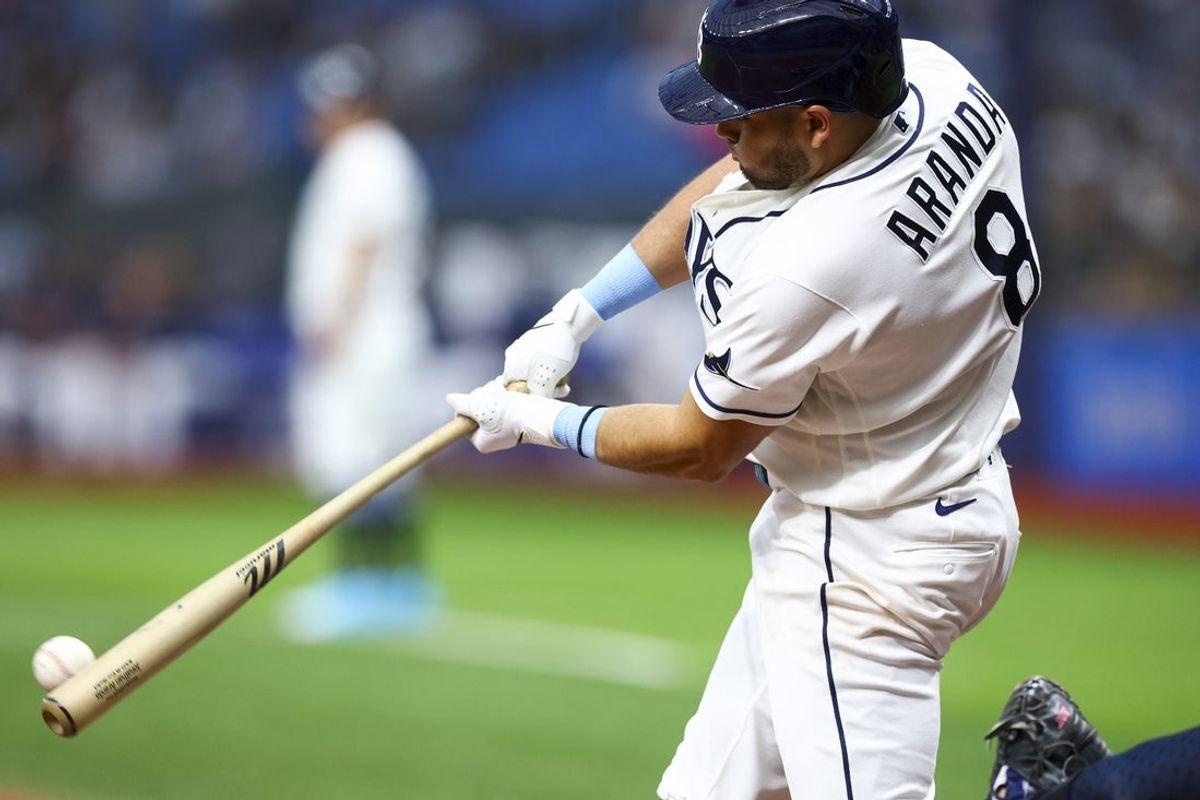 Jul 8, 2026; St. Petersburg, Florida, USA; Tampa Bay Rays first baseman Jonathan Aranda (8) hits an rbi double against the New York Yankees in the third inning at Tropicana Field. Mandatory Credit: Nathan Ray Seebeck-Imagn Images