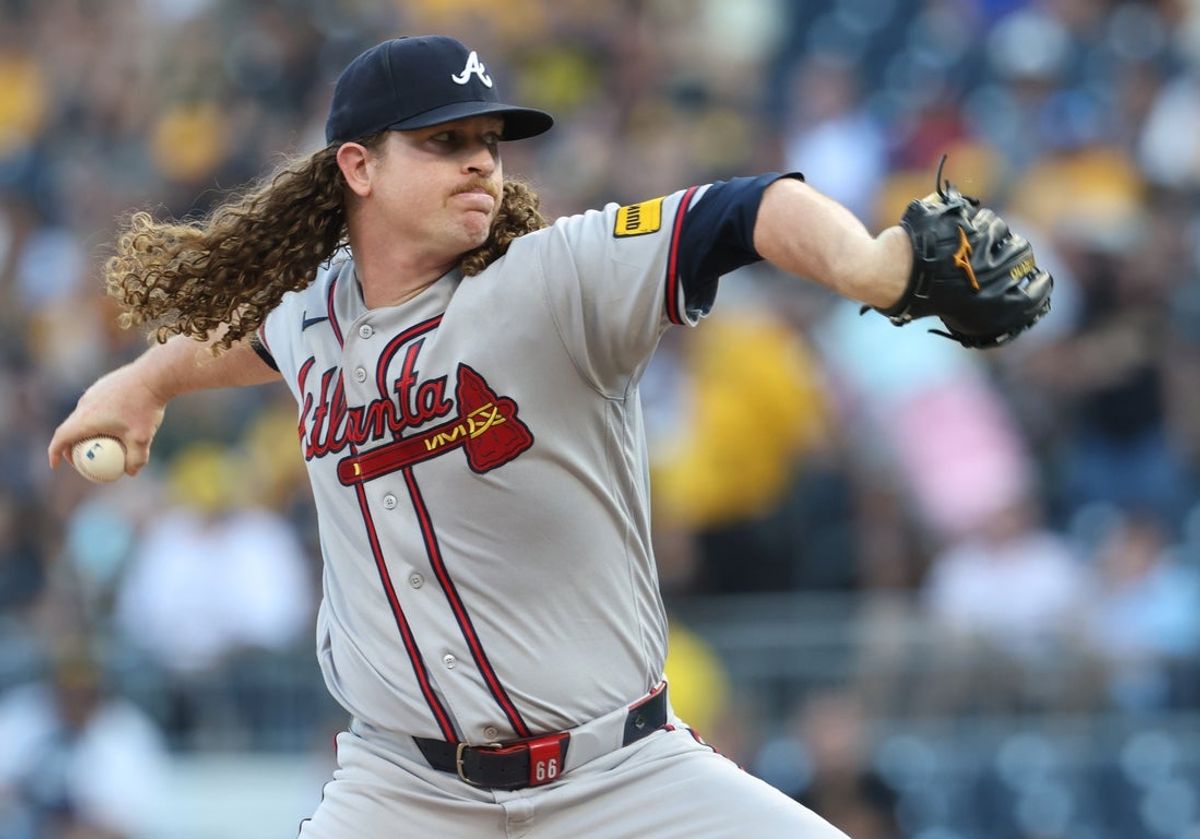 Jul 8, 2026; Pittsburgh, Pennsylvania, USA;  Atlanta Braves  starting pitcher Grant Holmes (66) delivers a pitch against the Pittsburgh Pirates during the first inning at PNC Park. Mandatory Credit: Charles LeClaire-Imagn Images