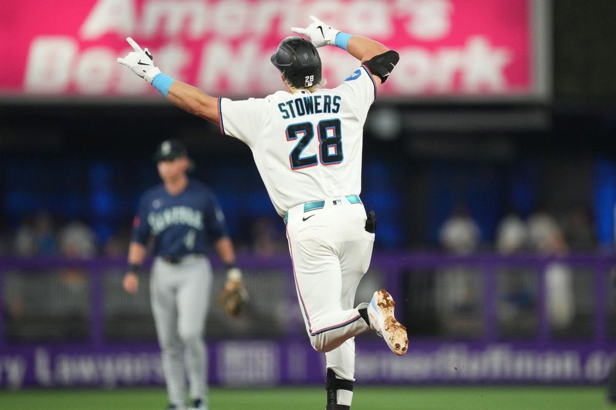 Jul 8, 2026; Miami, Florida, USA;  Miami Marlins first baseman Kyle Stowers (28) celebrates a solo home run in the first inning against the Seattle Mariners at loanDepot Park. Mandatory Credit: Jim Rassol-Imagn Images