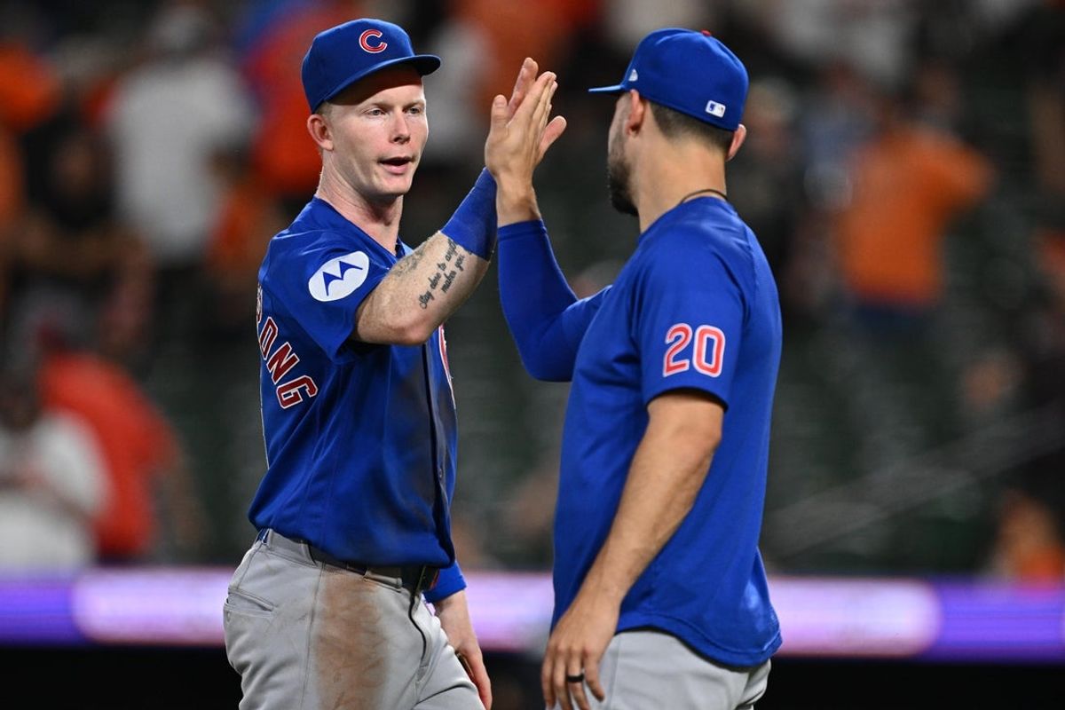Jul 8, 2026; Baltimore, Maryland, USA;  Chicago Cubs outfielder Pete Crow-Armstrong (4), left celebrates with outfielder Michael Conforto (20) after defeating the Baltimore Orioles at Oriole Park at Camden Yards. Mandatory Credit: Jamie Sabau-Imagn Images