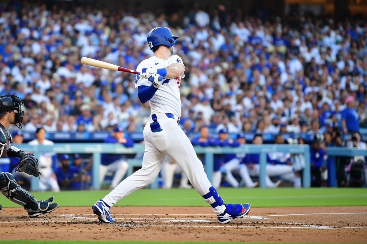 Jul 8, 2026; Los Angeles, California, USA; Los Angeles Dodgers right fielder Kyle Tucker (23) hits a 2-RBI single in the first inning against the Colorado Rockies at Dodger Stadium. Mandatory Credit: Gary A. Vasquez-Imagn Images