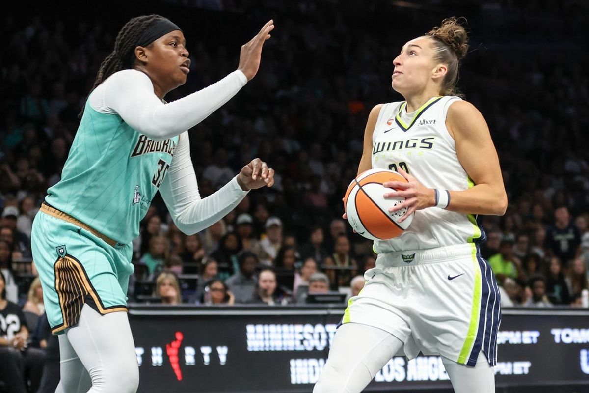 Jul 7, 2026; Brooklyn, New York, USA;  Dallas Wings forward Jessica Shepard (32) and New York Liberty center Jonquel Jones (35) at Barclays Center. Mandatory Credit: Wendell Cruz-Imagn Images
