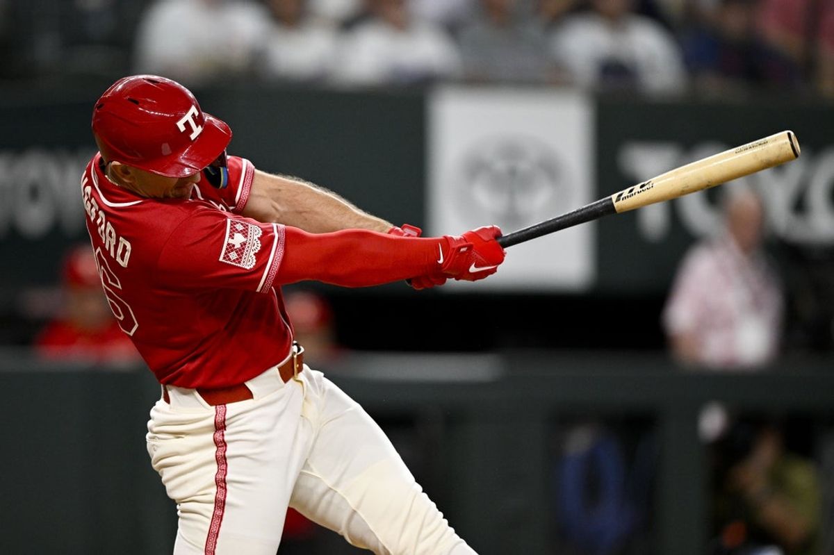 Jul 10, 2026; Arlington, Texas, USA; Texas Rangers left fielder Wyatt Langford (36) bats against the Houston Astros during the first inning at Globe Life Field. Mandatory Credit: Jerome Miron-Imagn Images