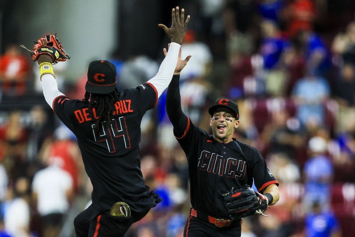 Jul 10, 2026; Cincinnati, Ohio, USA; Cincinnati Reds shortstop Elly de la Cruz (44) high fives outfielder Spencer Steer (7) after the victory over the Chicago Cubs at Great American Ball Park. Mandatory Credit: Katie Stratman-Imagn Images