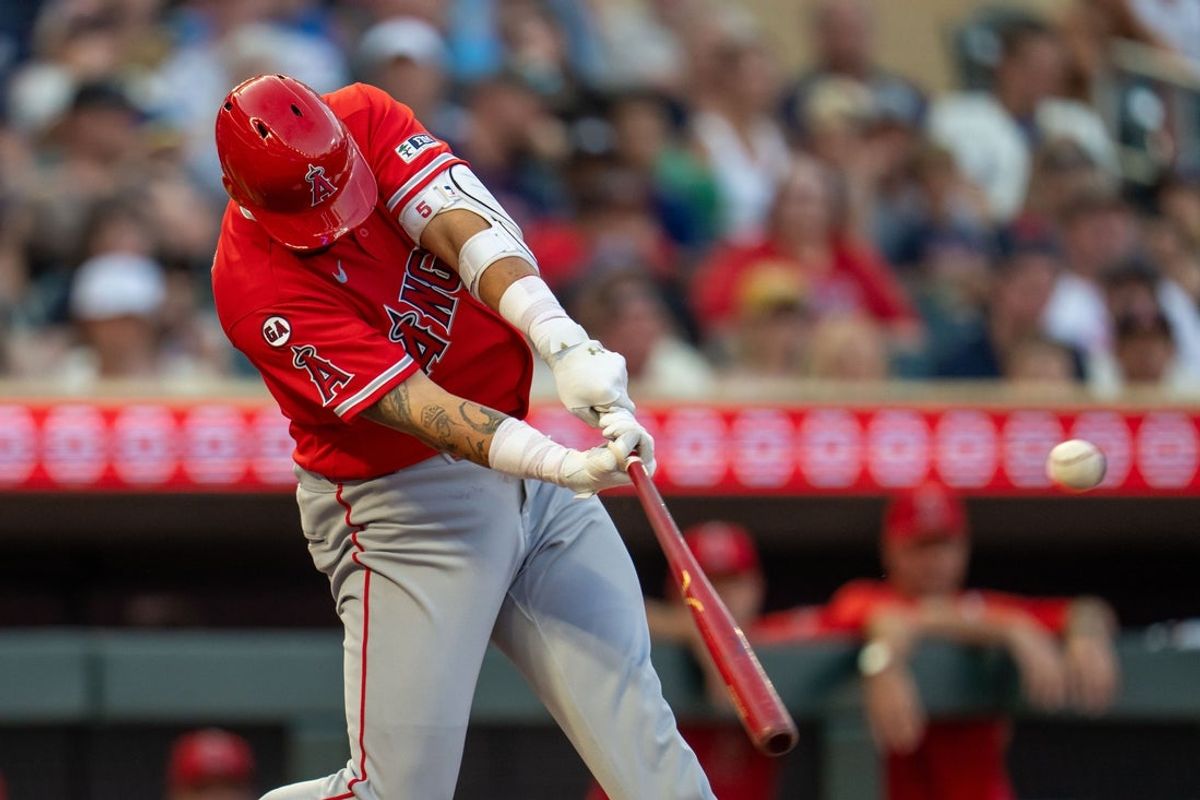 Jul 10, 2026; Minneapolis, Minnesota, USA; Los Angeles Angels third baseman Vaughn Grissom (5) hits a RBI sacrifice fly against the Minnesota Twins in the fifth inning at Target Field. Mandatory Credit: Jesse Johnson-Imagn Images