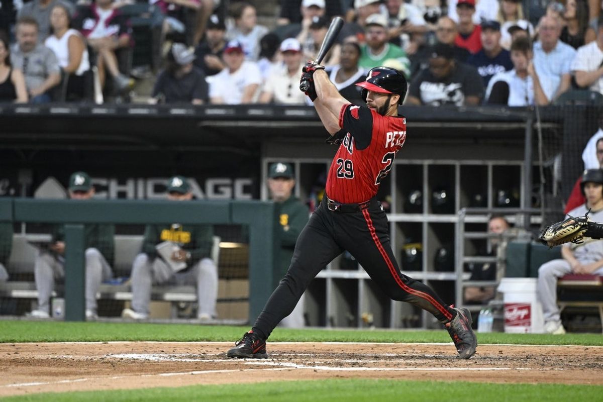 Jul 10, 2026; Chicago, Illinois, USA;  Chicago White Sox center fielder Tristan Peters (29) hits an RBI single during the fifth inning against the Athletics at Rate Field. Mandatory Credit: Matt Marton-Imagn Images