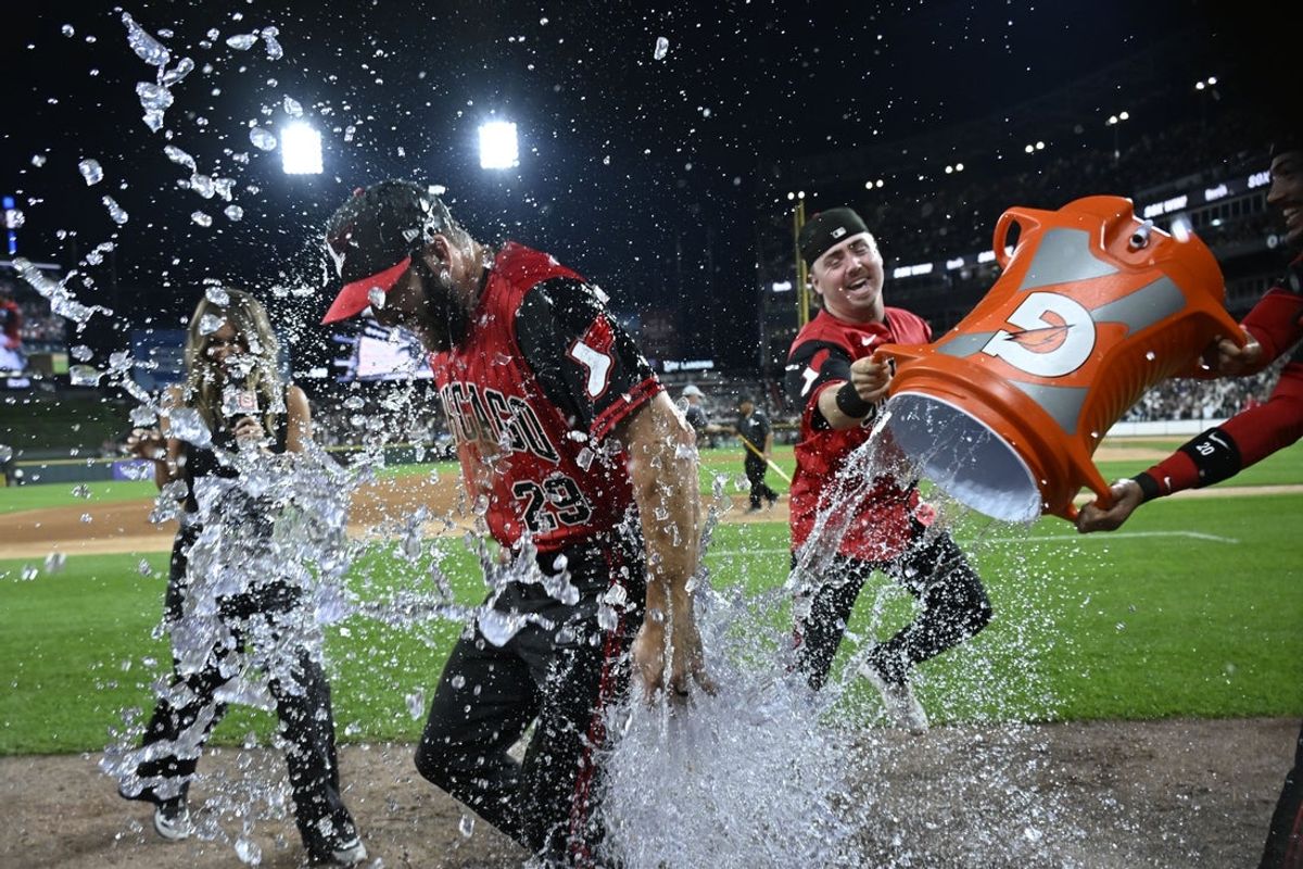 Jul 10, 2026; Chicago, Illinois, USA;  Chicago White Sox center fielder Tristan Peters (29) is doused by  second baseman Chase Meidroth (10) and  third baseman Miguel Vargas (20) after the game against the Athletics at Rate Field. Mandatory Credit: Matt Marton-Imagn Images