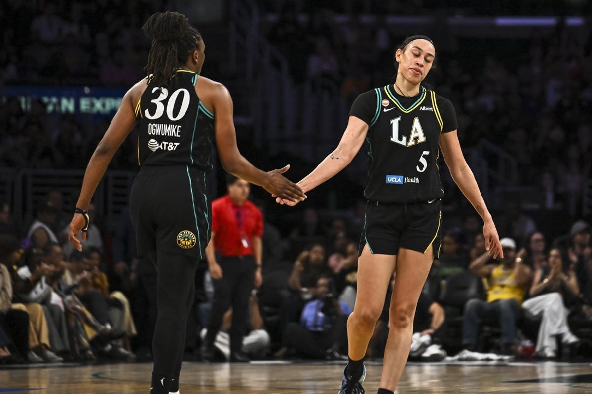 Jul 10, 2026; Los Angeles, California, USA; Chicago Sky forward Rickea Jackson (5) celebrates with forward Nneka Ogwumike (30) against the Chicago Sky during the second half at Crypto.com Arena. Mandatory Credit: Jonathan Hui-Imagn Images
