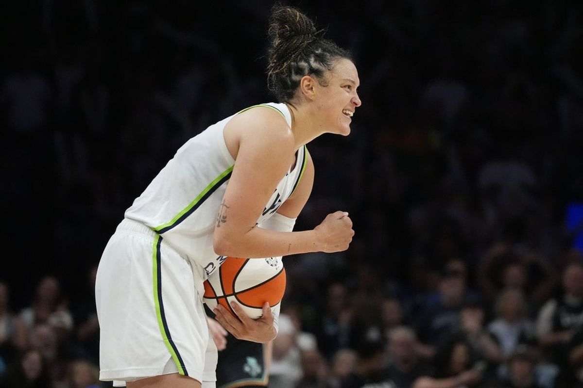 Jul 11, 2026; Minneapolis, Minnesota, USA; Minnesota Lynx guard Kayla McBride (21) holds onto the ball as time expires and defeats the New York Liberty at Target Center. Mandatory Credit: Bruce Kluckhohn-Imagn Images