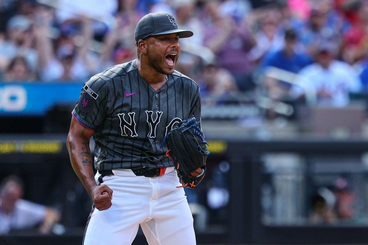 Jul 11, 2026; New York City, New York, USA;  New York Mets pitcher Freddy Peralta (51) reacts after recording a strike out to end the top of the second inning against the Boston Red Sox at Citi Field. Mandatory Credit: Vincent Carchietta-Imagn Images