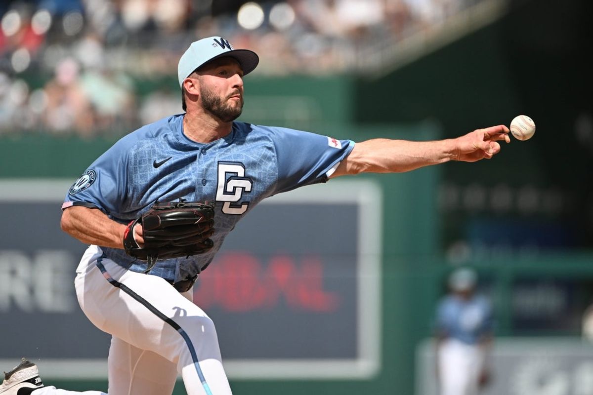 Jul 10, 2026; Washington, District of Columbia, USA; Washington Nationals pitcher PJ Poulin (50) throws to the New York Yankees during the first inning at Nationals Park. Mandatory Credit: Brad Mills-Imagn Images