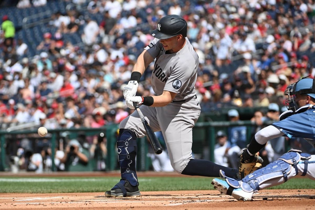 Jul 10, 2026; Washington, District of Columbia, USA; New York Yankees designated hitter Ben Rice (22) singles against the Washington Nationals during the first inning at Nationals Park. Mandatory Credit: Brad Mills-Imagn Images