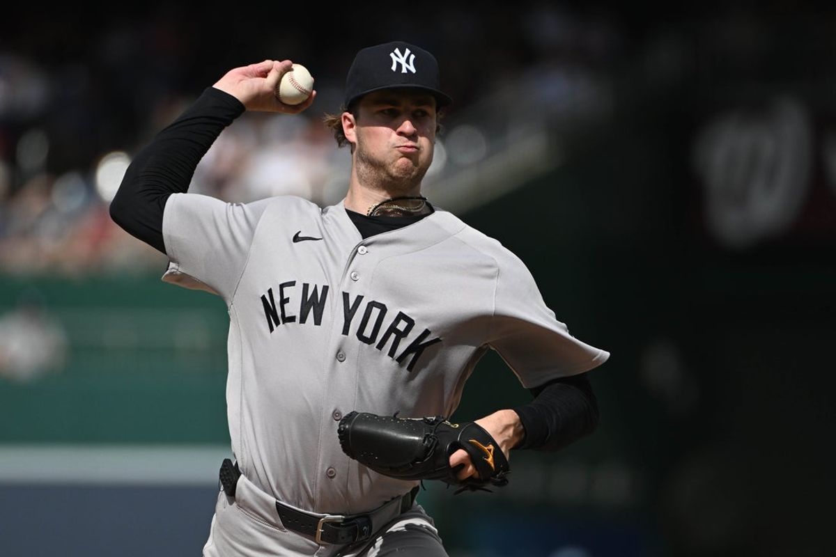 Jul 10, 2026; Washington, District of Columbia, USA; New York Yankees pitcher Cam Schlittler (31) throws to the Washington Nationals during the first inning at Nationals Park. Mandatory Credit: Brad Mills-Imagn Images