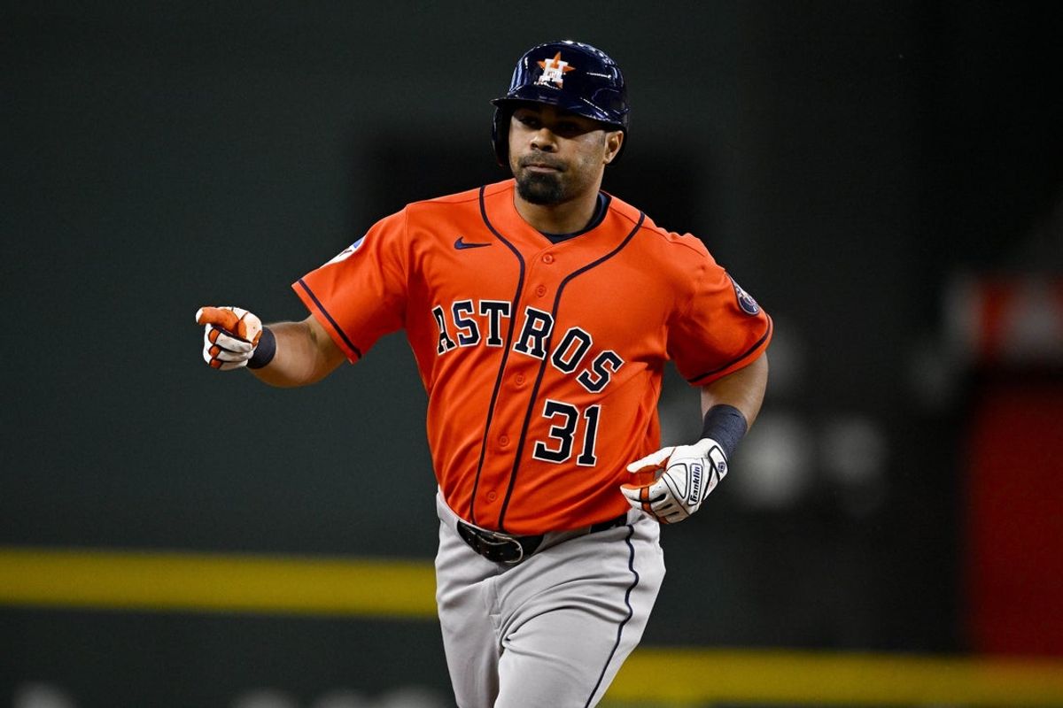 Jul 11, 2026; Arlington, Texas, USA; Houston Astros right fielder LaMonte Wade Jr. (31) rounds the bases after he hits a grand slam home run against the Texas Rangers during the third inning at Globe Life Field. Mandatory Credit: Jerome Miron-Imagn Images