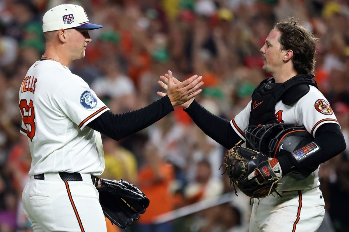 Jul 11, 2026; Baltimore, Maryland, USA; Baltimore Orioles pitcher Tyler Wells (68) celebrates with Baltimore Orioles catcher Adley Rutschman (35) after a game against the Kansas City Royals at Oriole Park at Camden Yards. Mandatory Credit: Daniel Kucin Jr.-Imagn Images