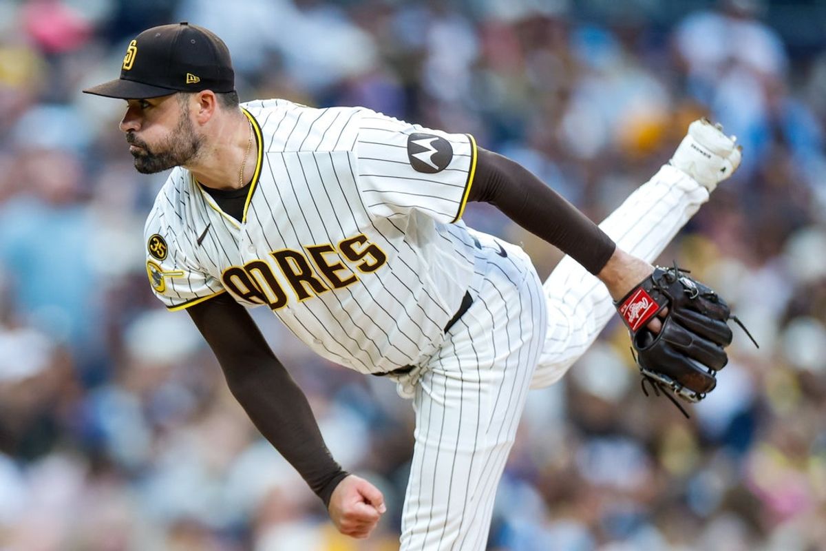 Jul 11, 2026; San Diego, California, USA; San Diego Padres relief pitcher Matt Waldron (61) throws a pitch during the fourth inning against the Toronto Blue Jays at Petco Park. Mandatory Credit: David Frerker-Imagn Images
