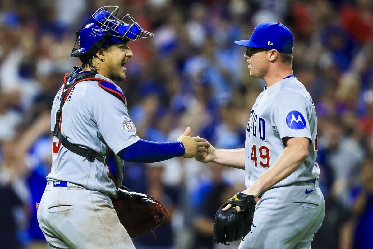 Jul 11, 2026; Cincinnati, Ohio, USA; Chicago Cubs catcher Miguel Amaya (9) reacts with relief pitcher Trent Thornton (49) after the victory over the Cincinnati Reds at Great American Ball Park. Mandatory Credit: Katie Stratman-Imagn Images