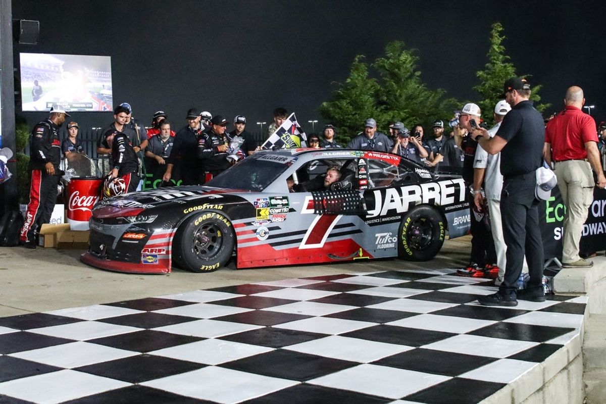 Jul 11, 2026; Hampton, Georgia, USA; Jarrett Logistics driver Justin Allgaier (7) drives his car onto victory lane after a victory at the Focused Health 250 at EchoPark Speedway. Mandatory Credit: Jordan Godfree-Imagn Images