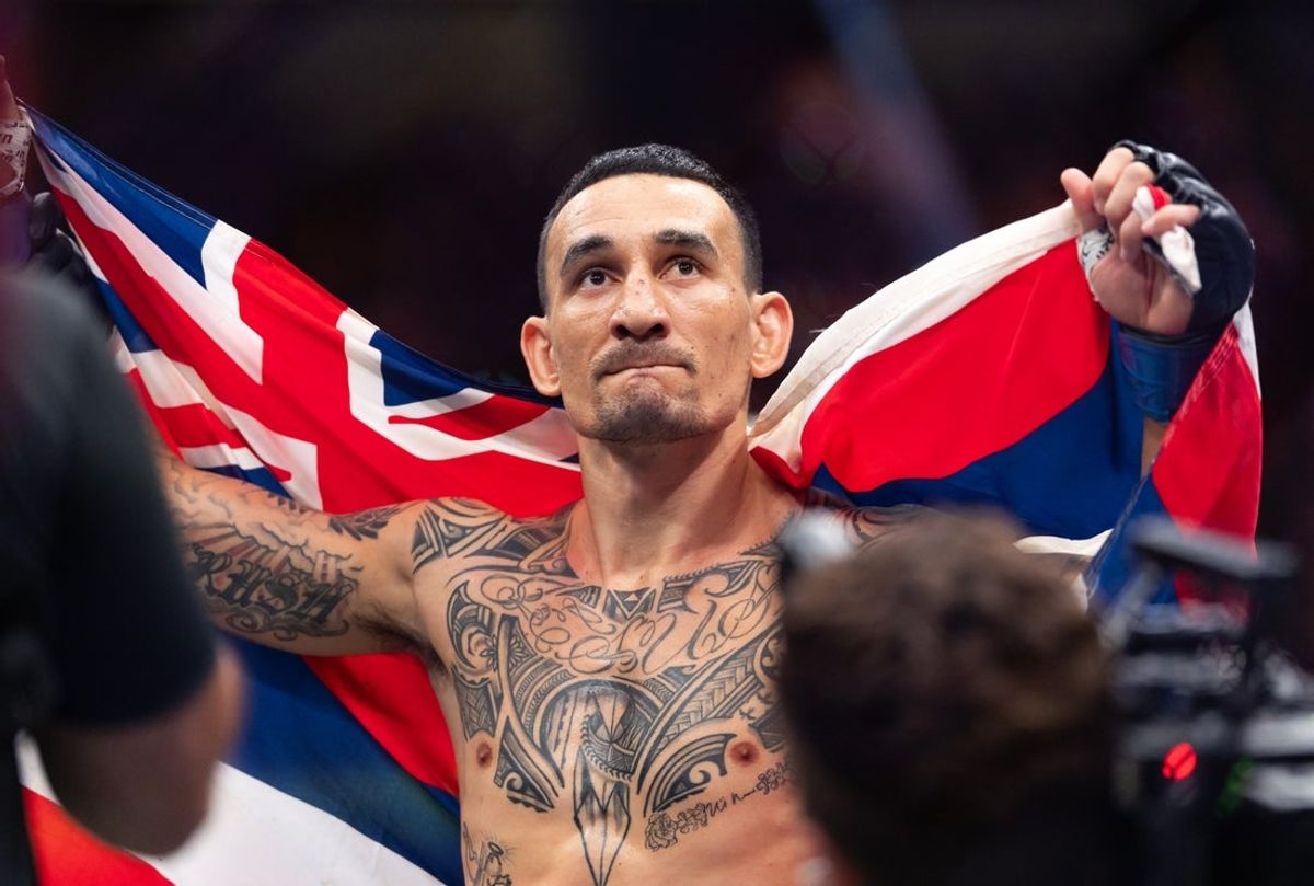 Jul 11, 2026; Las Vegas, Nevada, USA; Max Holloway celebrates after defeating Conor McGregor (not pictured) during UFC 329 at T-Mobile Arena. Mandatory Credit: Mark J. Rebilas-Imagn Images