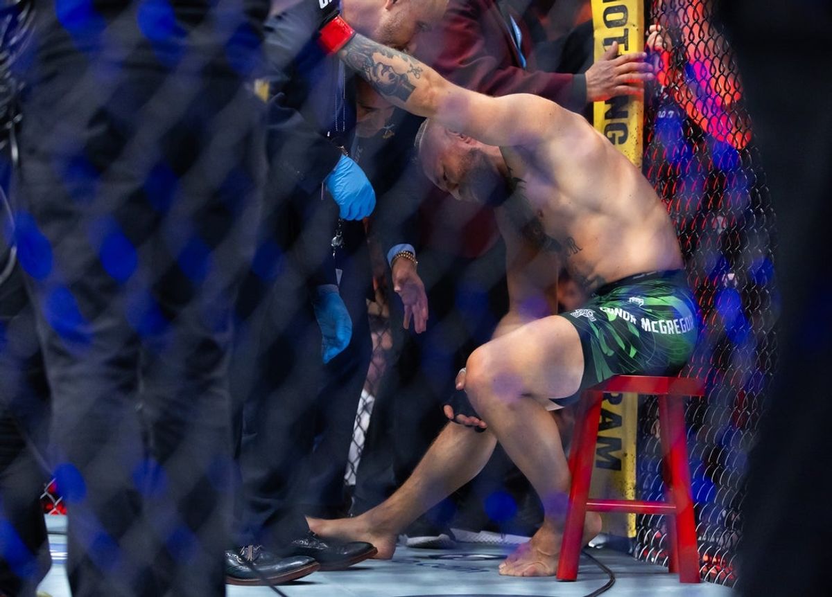 Jul 11, 2026; Las Vegas, Nevada, USA; Conor McGregor reacts after suffering an injury the ended his fight with Max Holloway during UFC 329 at T-Mobile Arena. Mandatory Credit: Mark J. Rebilas-Imagn Images