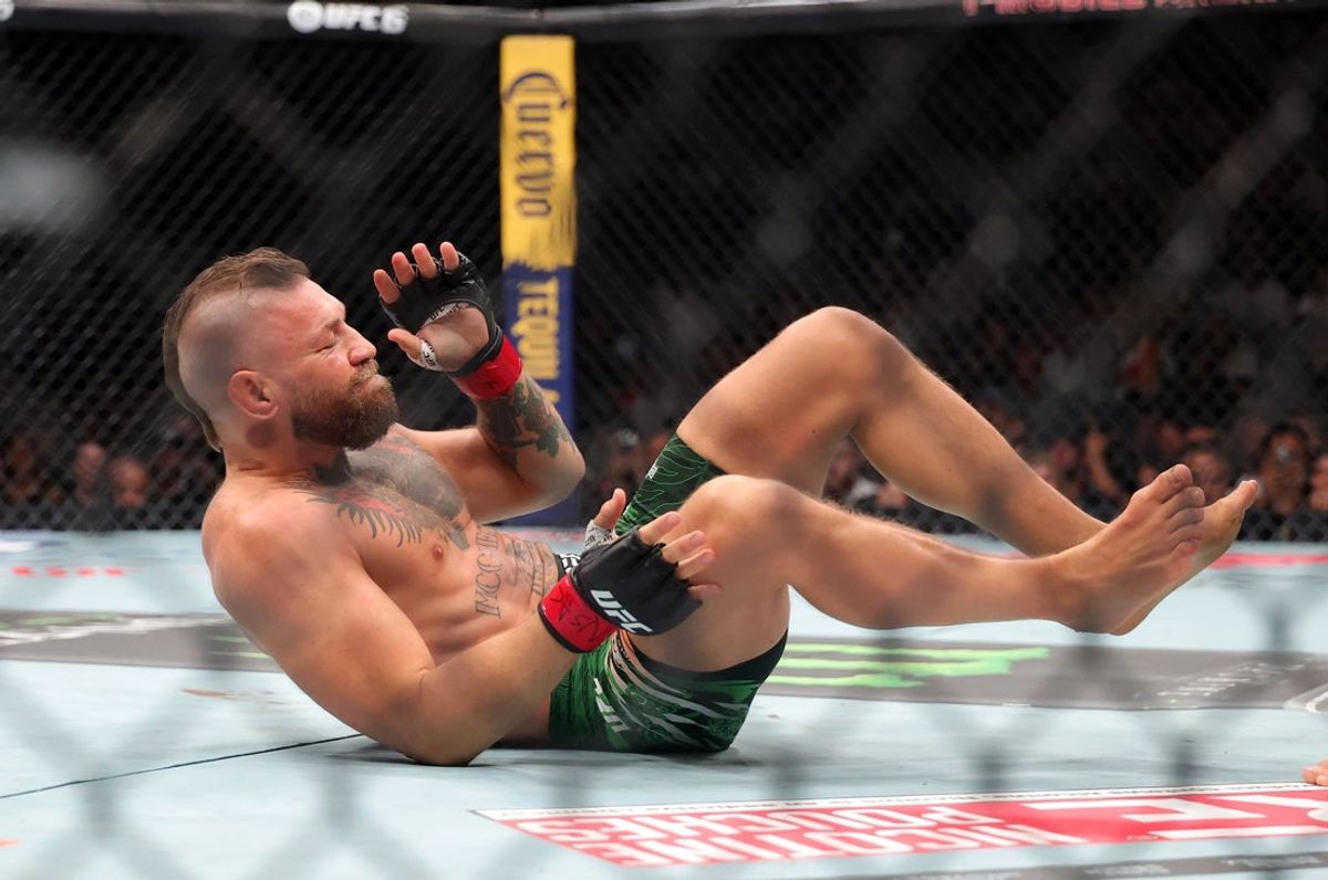 Jul 11, 2026; Las Vegas, Nevada, USA; Conor McGregor on the ground during UFC 329 at T-Mobile Arena. Mandatory Credit: Mark J. Rebilas-Imagn Images
