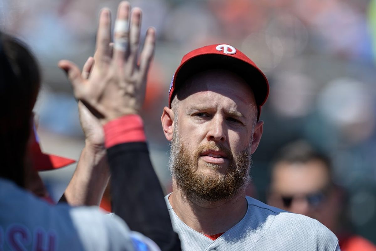 Jul 12, 2026; Detroit, Michigan, USA; Philadelphia Phillies starting pitcher Zack Wheeler (45) celebrates in the dugout after throwing six shutout innings against the Detroit Tigers at Comerica Park. Mandatory Credit: Lon Horwedel-Imagn Images