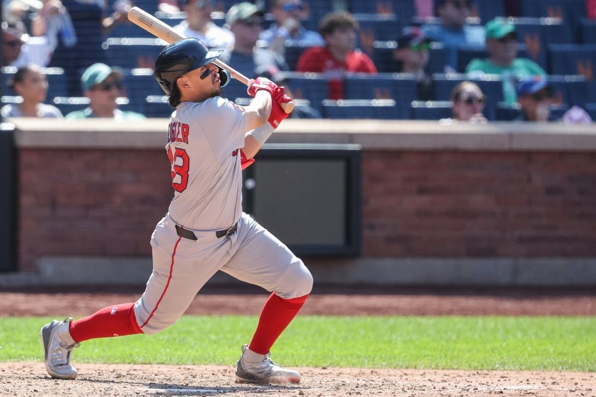 Jul 12, 2026; New York City, New York, USA;  Boston Red Sox second baseman Anthony Seigler (48) hits a run scoring sacrifice fly in the tenth inning against the New York Mets at Citi Field. Mandatory Credit: Wendell Cruz-Imagn Images