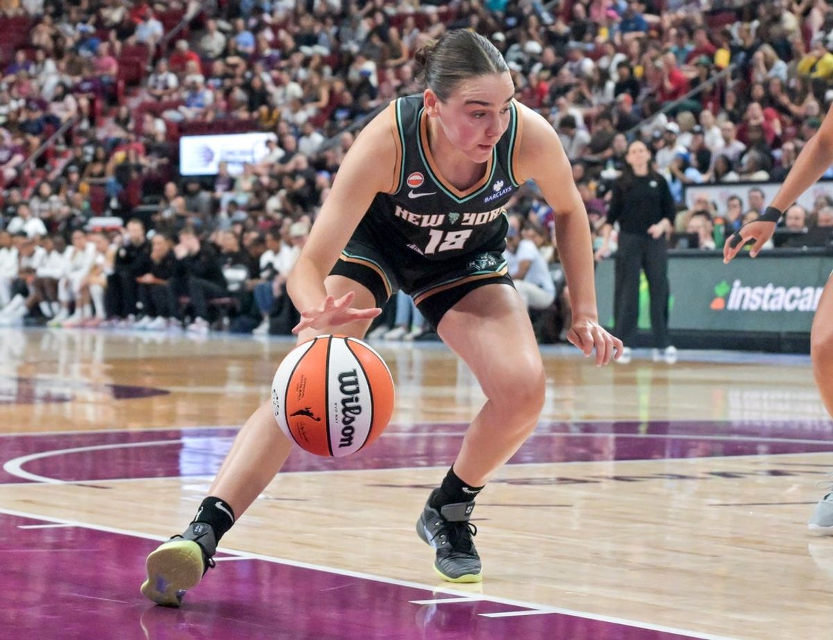 Jul 12, 2026; Montreal, Quebec, CAN; New York Liberty guard Pauline Astier (18) dribbles against the Toronto Tempo during the second half at the Bell Centre. Mandatory Credit: Eric Bolte-Imagn Images