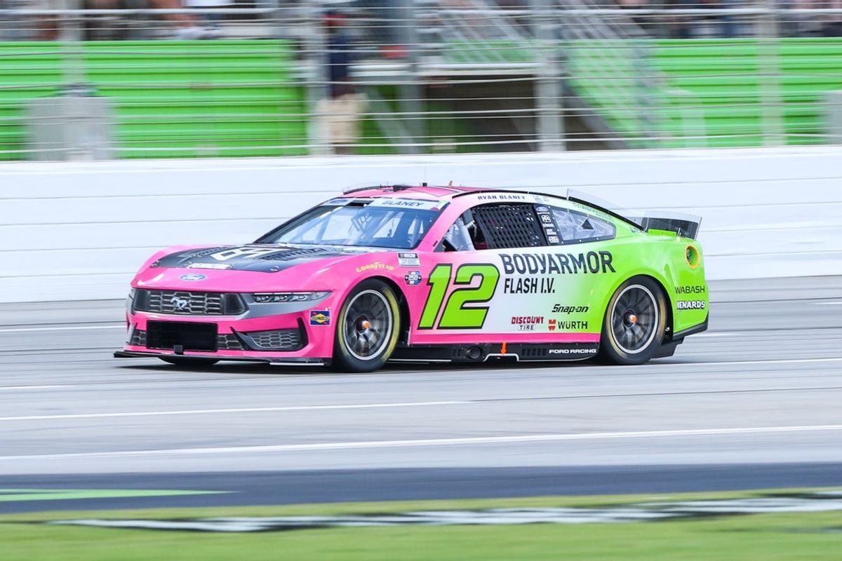 Jul 12, 2026; Hampton, Georgia, USA; Body Armor Flash I.V. driver Ryan Blaney (12) races during the Quaker State 400 at EchoPark Speedway. Mandatory Credit: Jordan Godfree-Imagn Images