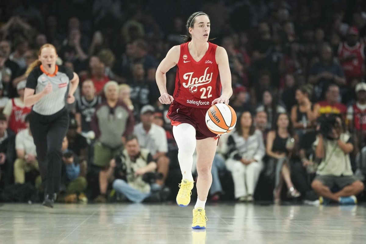 Jul 12, 2026; Las Vegas, Nevada, USA; Indiana Fever guard Caitlin Clark (22) dribbles the ball during the first quarter of a WNBA basketball game against the Las Vegas Aces at Michelob Ultra Arena. Mandatory Credit: Lucas Peltier-Imagn Images