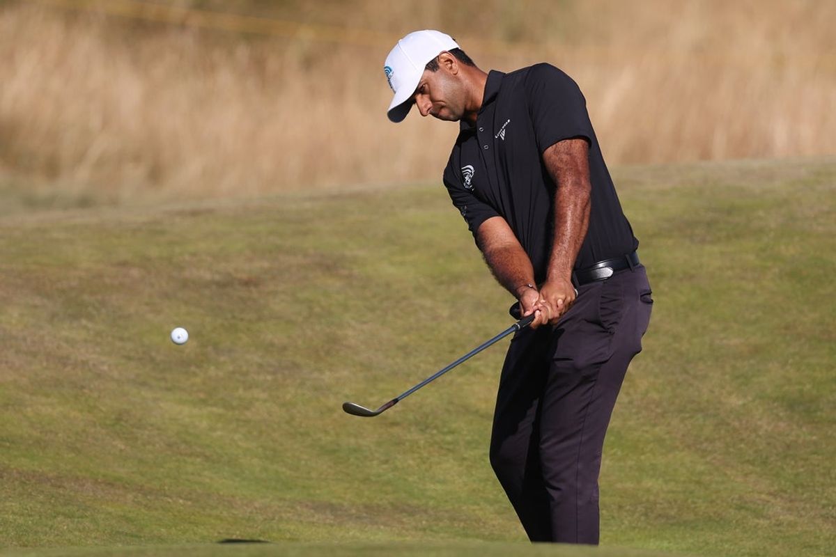 Jul 14, 2026; Southport, England; Aaron Rai chips on the third hole during a practice round for The Open Championship golf tournament at Royal Birkdale. Mandatory Credit: Bill Streicher-Imagn Images