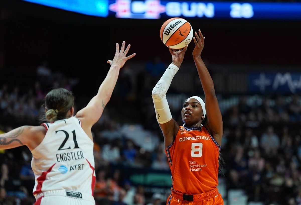 Jul 14, 2026; Uncasville, Connecticut, USA; Connecticut Sun forward Aaliyah Edwards (8) shoots the ball against Portland Fire forward Emily Engstler (21) in the first half at Mohegan Sun Arena. Mandatory Credit: David Butler II-Imagn Images