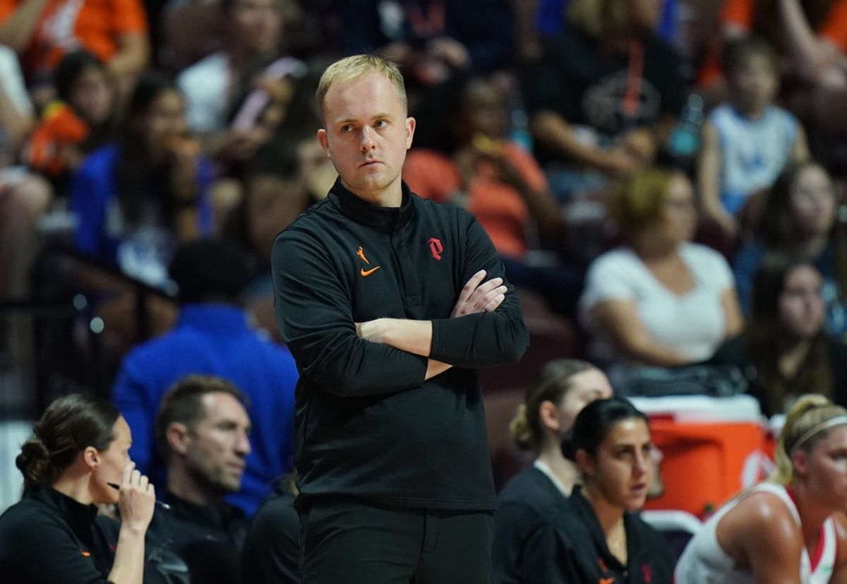 Jul 14, 2026; Uncasville, Connecticut, USA; Portland Fire head coach Alex Sarama watches from the sideline as they take on the Connecticut Sun at Mohegan Sun Arena. Mandatory Credit: David Butler II-Imagn Images