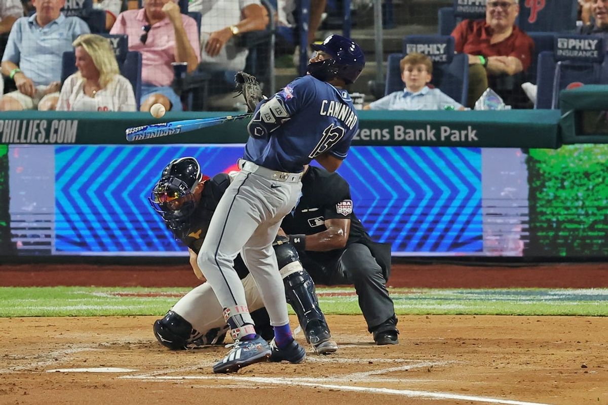 Jul 14, 2026; Philadelphia, Pennsylvania, USA; American League Tampa Bay Rays third baseman Junior Caminero (13) is hit by the pitch during the third inning against the National League at Citizens Bank Park. Mandatory Credit: Brad Penner-Imagn Images