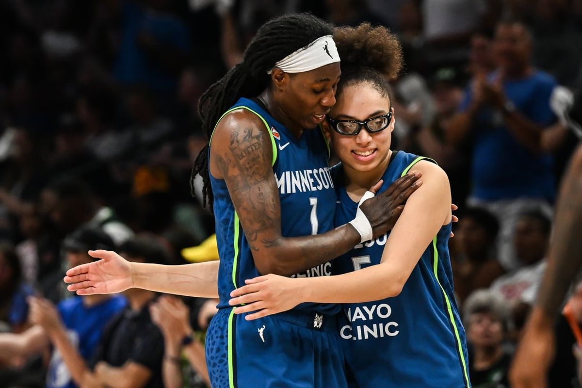 Jul 15, 2026; Minneapolis, Minnesota, USA; Minnesota Lynx forward Natasha Howard (1) and guard Olivia Miles (5) react late during the fourth quarter against the Los Angeles Sparks at Target Center. Mandatory Credit: Jeffrey Becker-Imagn Images