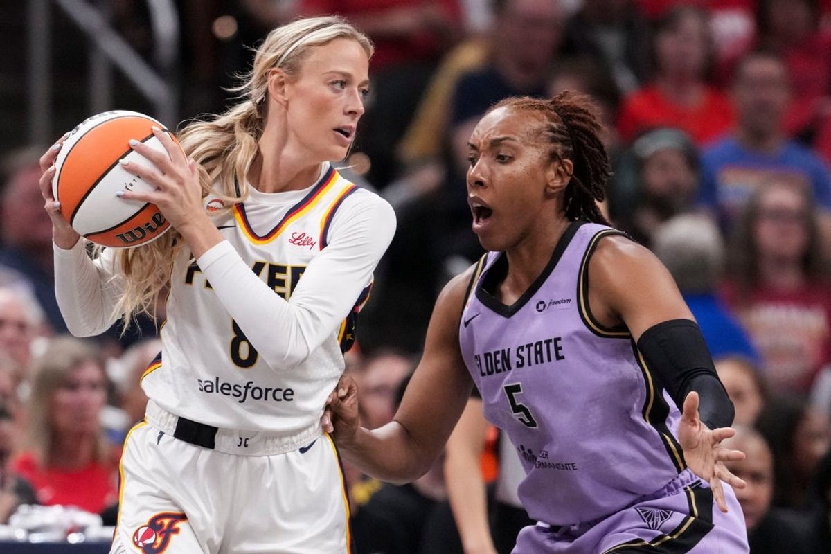 Golden State Valkyries forward Kayla Thornton (5) guards Indiana Fever guard Sophie Cunningham (8) on Wednesday, July 15, 2026, during the first half of a game at Gainbridge Fieldhouse in Indianapolis.