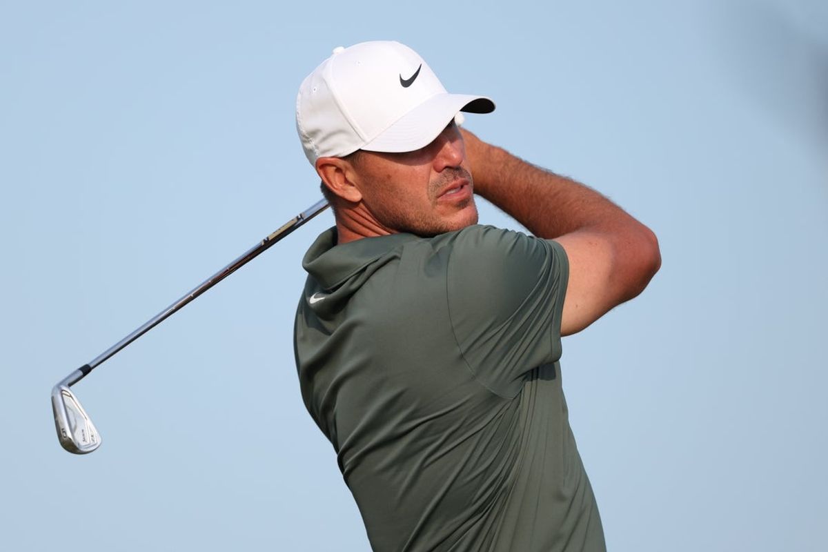 Jul 16, 2026; Southport, ENG; Brooks Koepka plays his tee shot on the 16th hole during the first round of The Open Championship golf tournament at Royal Birkdale. Mandatory Credit: Bill Streicher-Imagn Images