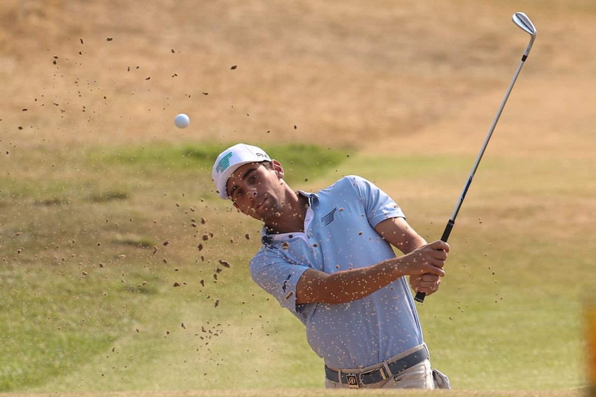 Jul 17, 2026; Southport, ENG; Joaquin Niemann plays his shot from a bunker by the tenth green during the second round of The Open Championship golf tournament at Royal Birkdale. Mandatory Credit: Bill Streicher-Imagn Images