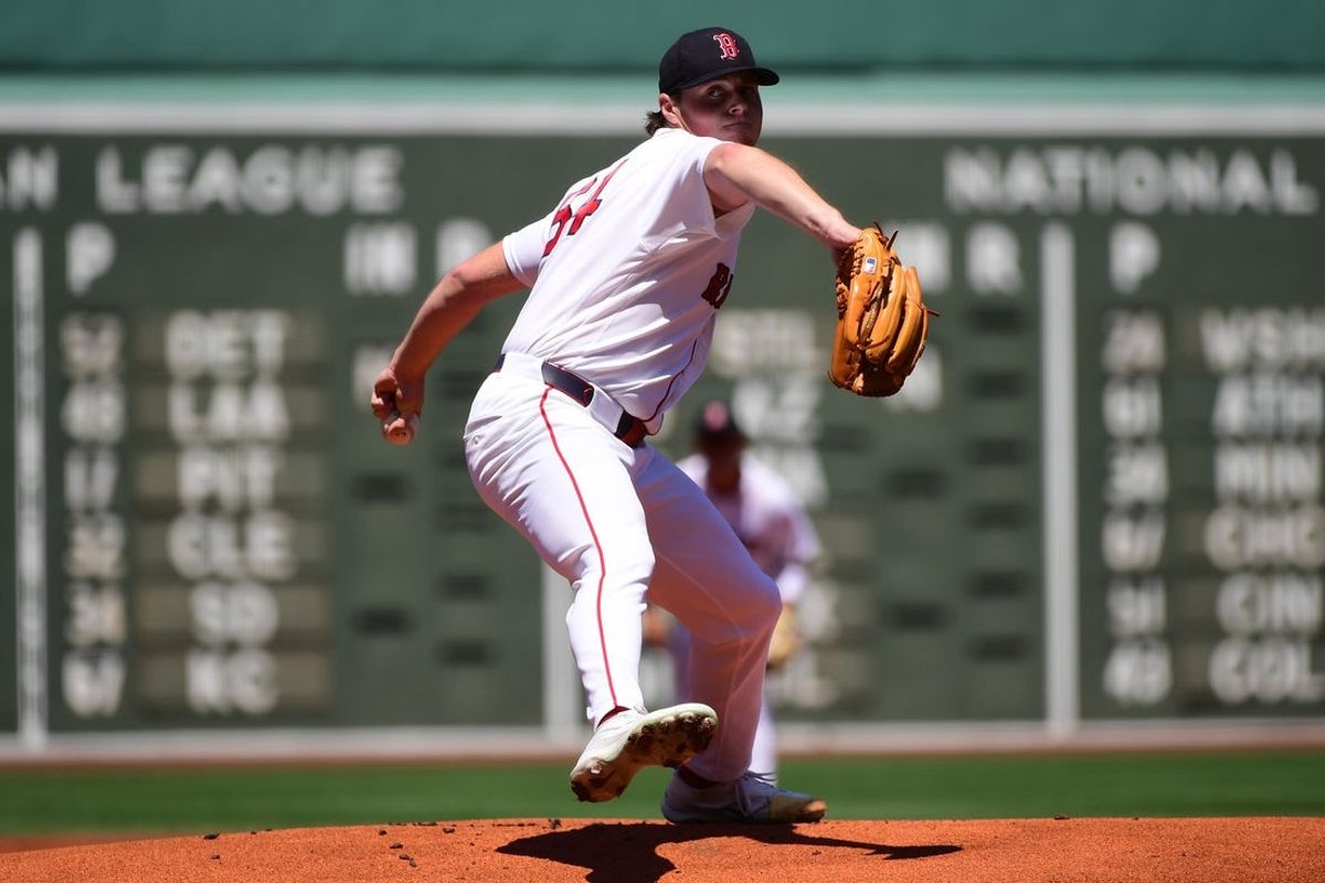 Jul 17, 2026; Boston, Massachusetts, USA;  Boston Red Sox pitcher Jake Bennett (64) pitches during the first inning against the Tampa Bay Rays at Fenway Park. Mandatory Credit: Bob DeChiara-Imagn Images