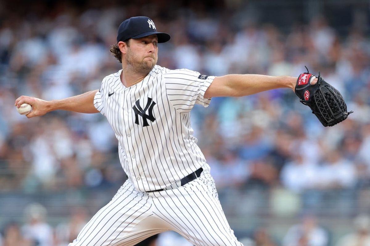 Jul 17, 2026; Bronx, New York, USA; New York Yankees starting pitcher Gerrit Cole (45) pitches against the Los Angeles Dodgers during the first inning at Yankee Stadium. Mandatory Credit: Brad Penner-Imagn Images