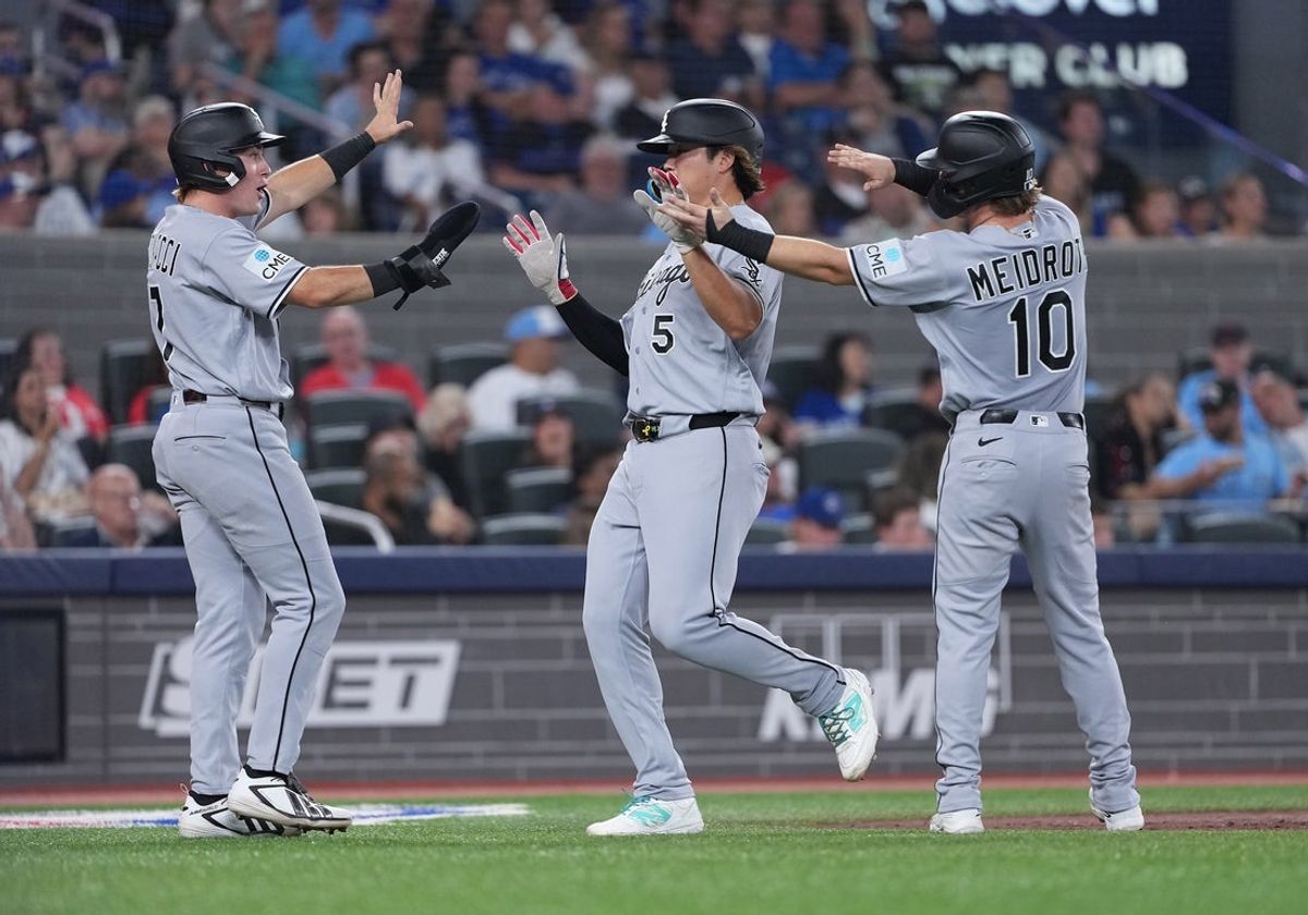 Jul 17, 2026; Toronto, Ontario, CAN; Chicago White Sox infielders Munetaka Murakami (5) and Chase Meidroth (10) celebrate with outfielder Sam Antonacci (17) after scoring on a three-RBI double hit by shortstop Colson Montgomery (not pictured) against the Toronto Blue Jays during the fifth inning at Rogers Centre. Mandatory Credit: Nick Turchiaro-Imagn Images