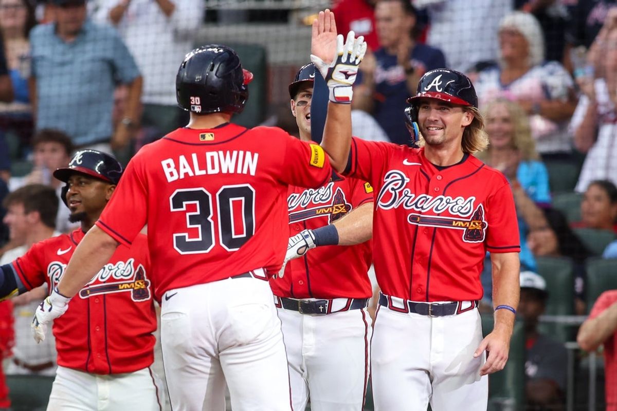 Jul 17, 2026; Atlanta, Georgia, USA; Atlanta Braves catcher Drake Baldwin (30) celebrates  with shortstop Jim Jarvis (74) after a three-run home run against the Texas Rangers in the fourth inning at Truist Park. Mandatory Credit: Brett Davis-Imagn Images