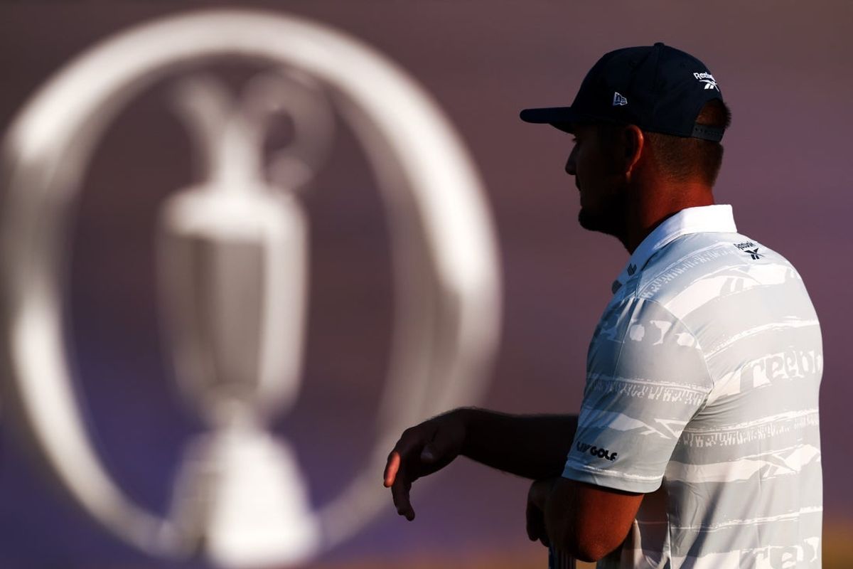 Jul 18, 2026; Southport, ENG; Bryson DeChambeau waits to putt on hole 18 during the third round of The Open Championship golf tournament at Royal Birkdale. Mandatory Credit: Bill Streicher-Imagn Images