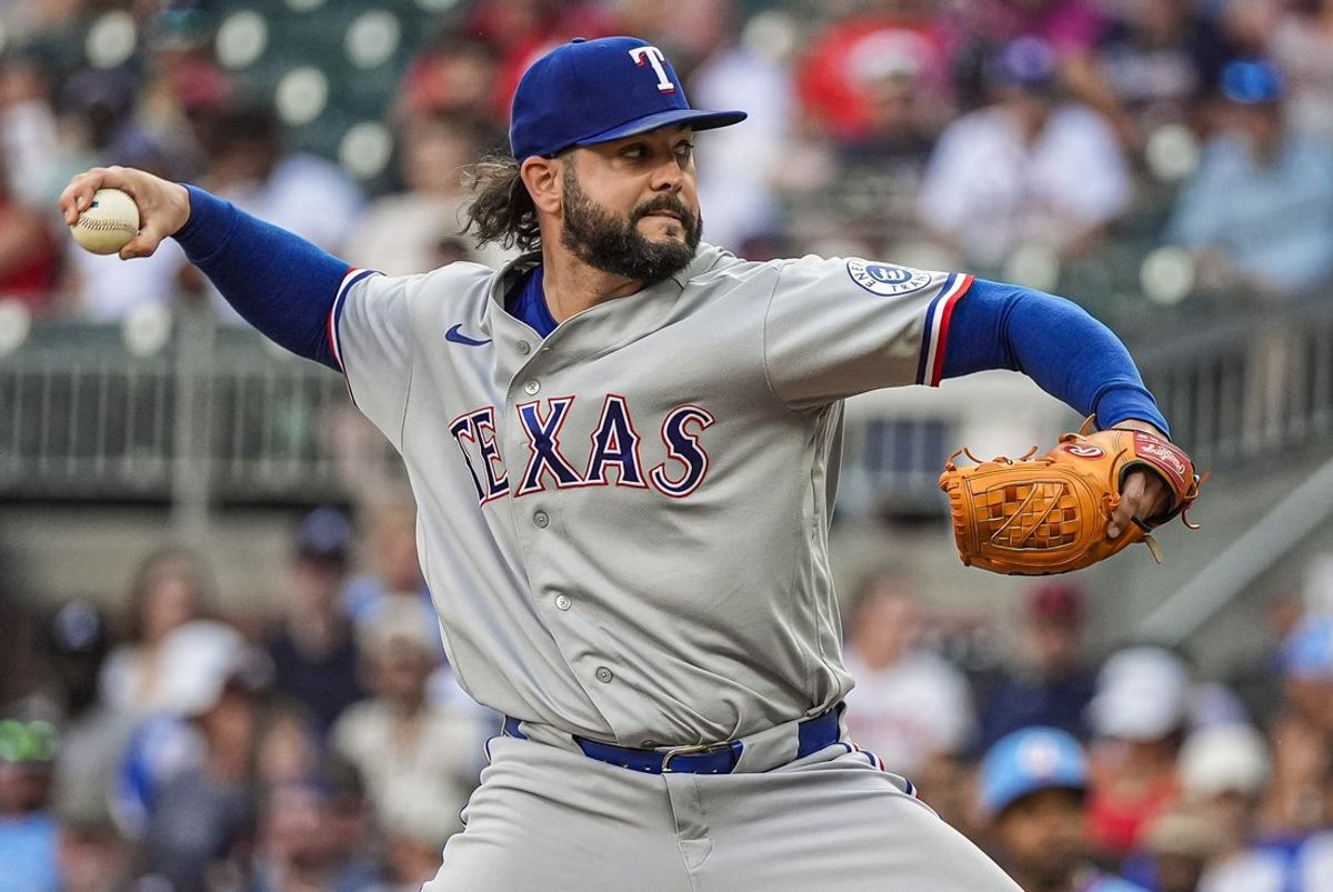 Jul 18, 2026; Cumberland, Georgia, USA; Texas Rangers pitcher Jakob Junis (16) pitches against the Atlanta Braves during the eighth inning at Truist Park. Mandatory Credit: Dale Zanine-Imagn Images
